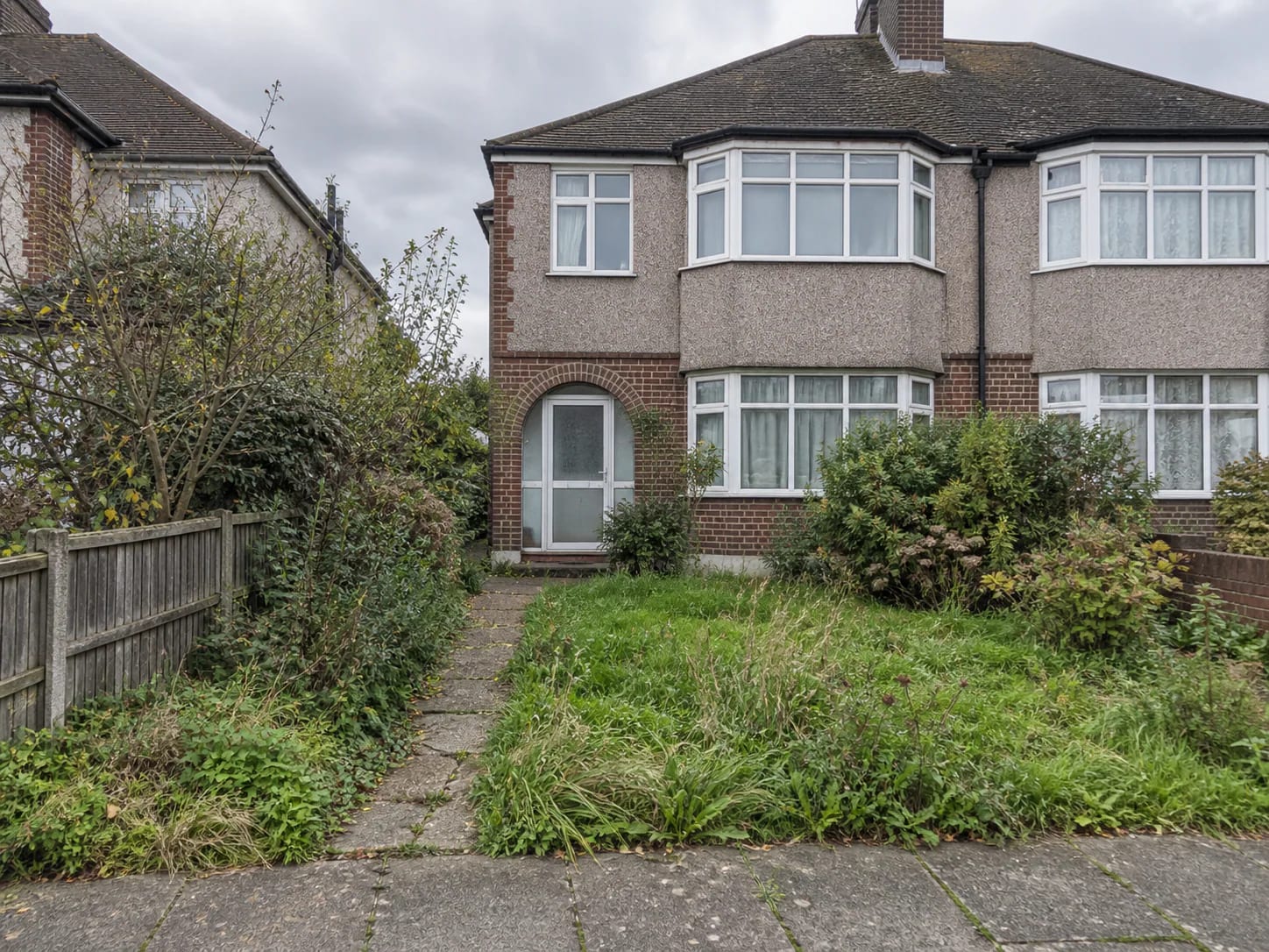 Front garden and driveway, Purley: Overgrown front garden with cracked path